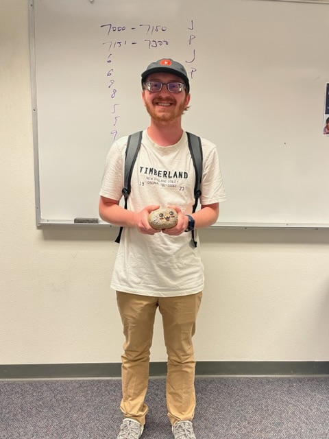 Cash owner of Rock Bottom pet rock care service